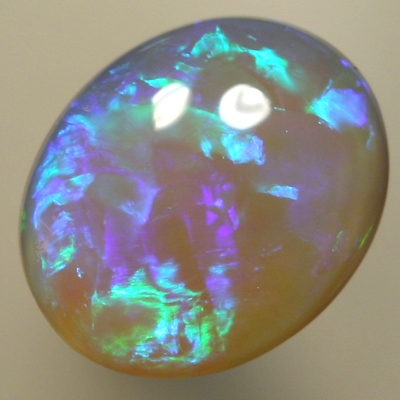 SOLID CRYSTAL OPAL Bright green and turquoise over a purple hue